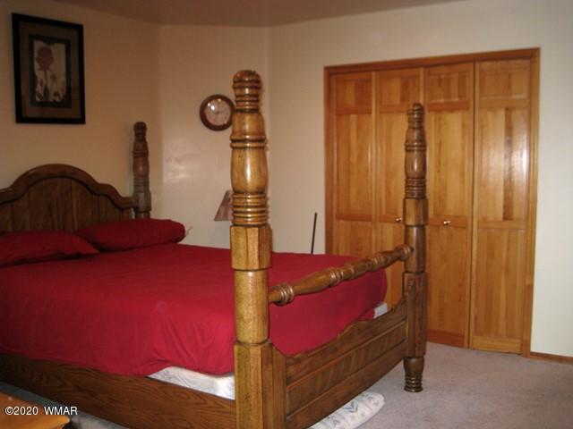 1922 Artist Draw Road Heber, AZ 85928 - Photo 42 of 63 a bedroom with a bed and a table