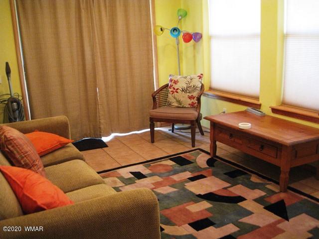 1922 Artist Draw Road Heber, AZ 85928 - Photo 49 of 63 a bedroom with furniture and a window