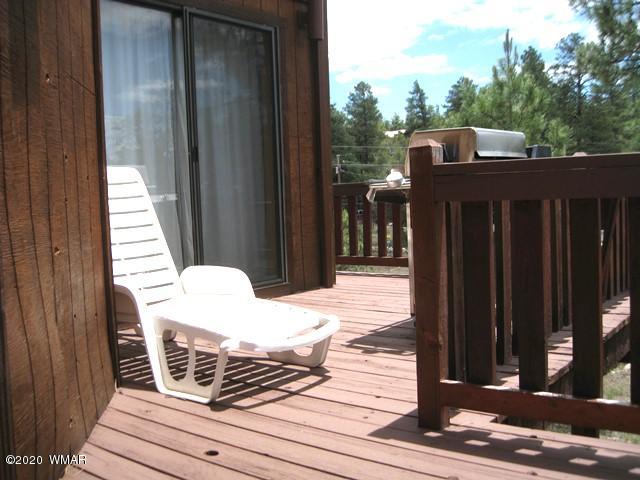 1922 Artist Draw Road Heber, AZ 85928 - Photo 55 of 63 a view of balcony with wooden floor and outdoor seating