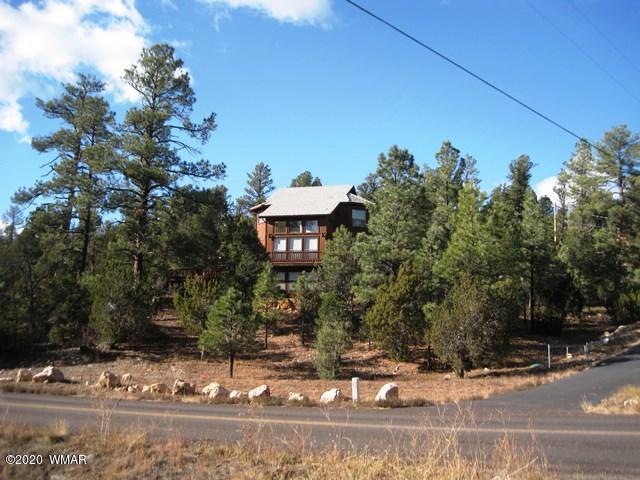 1922 Artist Draw Road Heber, AZ 85928 - Photo 6 of 63 a front view of a house with a yard
