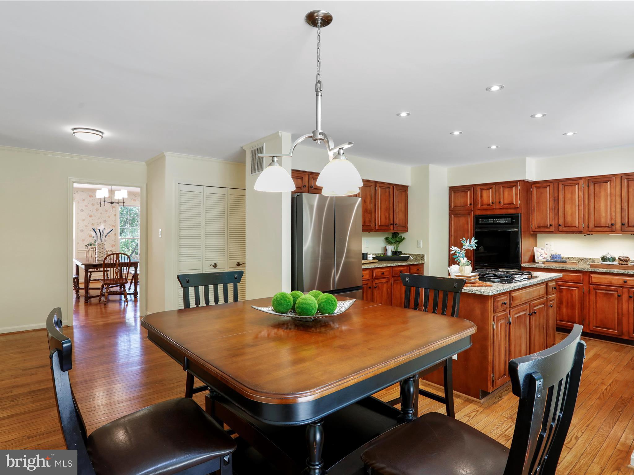 1350 Hunter Mill Road Reston, VA 20190 - Photo 20 of 75 a view of a dining room with furniture