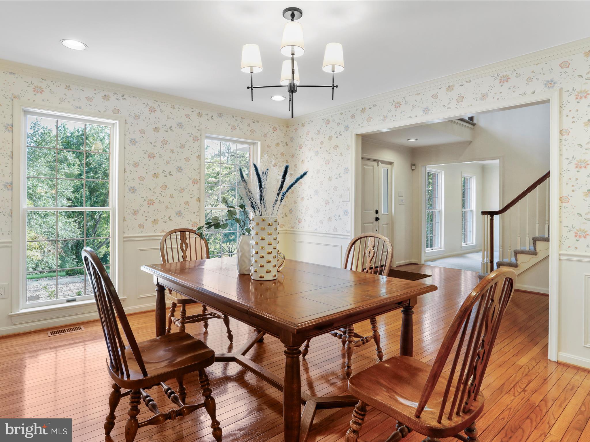 1350 Hunter Mill Road Reston, VA 20190 - Photo 24 of 75 a view of a dining room with furniture window and wooden floor