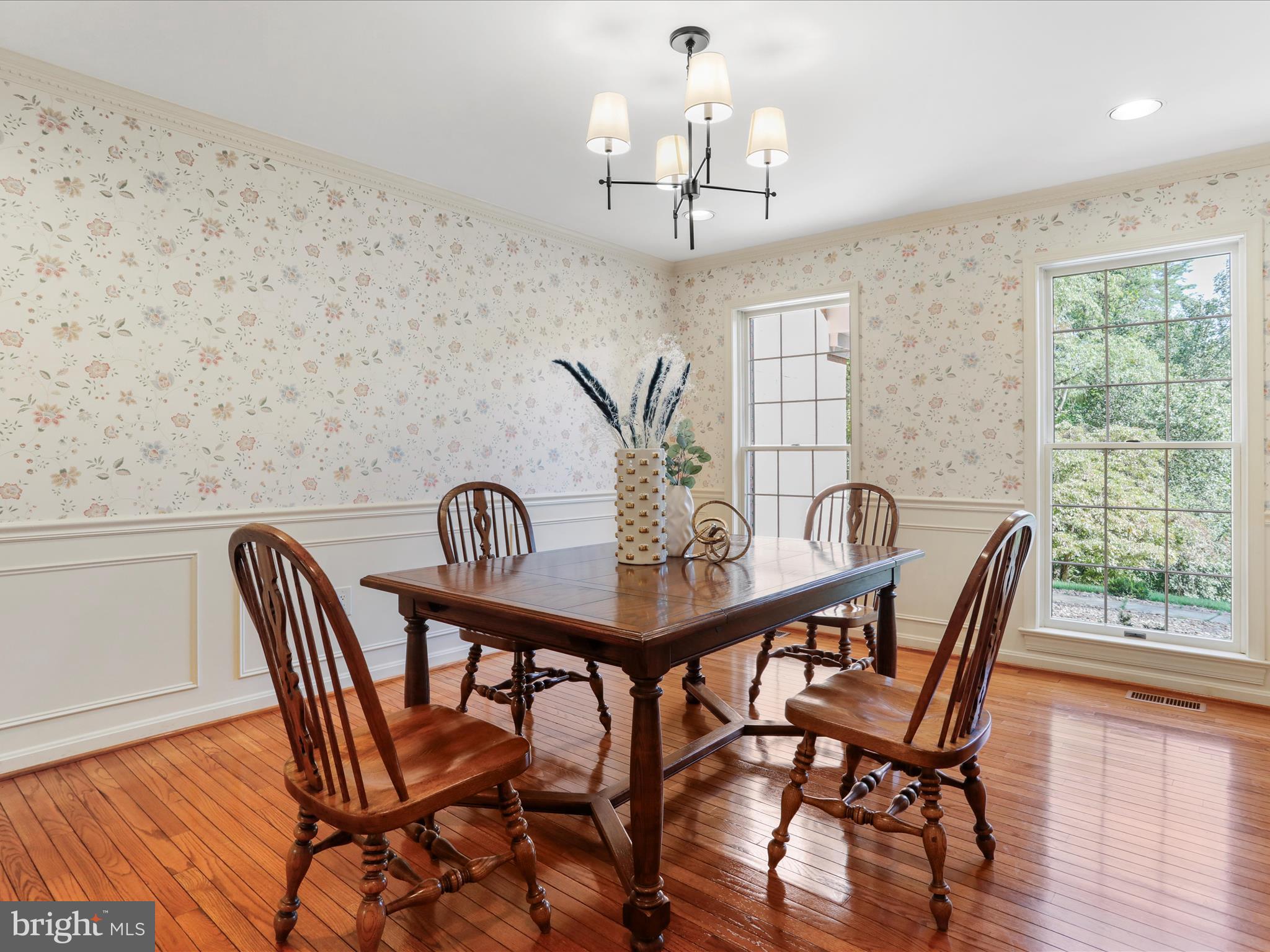 1350 Hunter Mill Road Reston, VA 20190 - Photo 25 of 75 a view of a dining room with furniture window and wooden floor