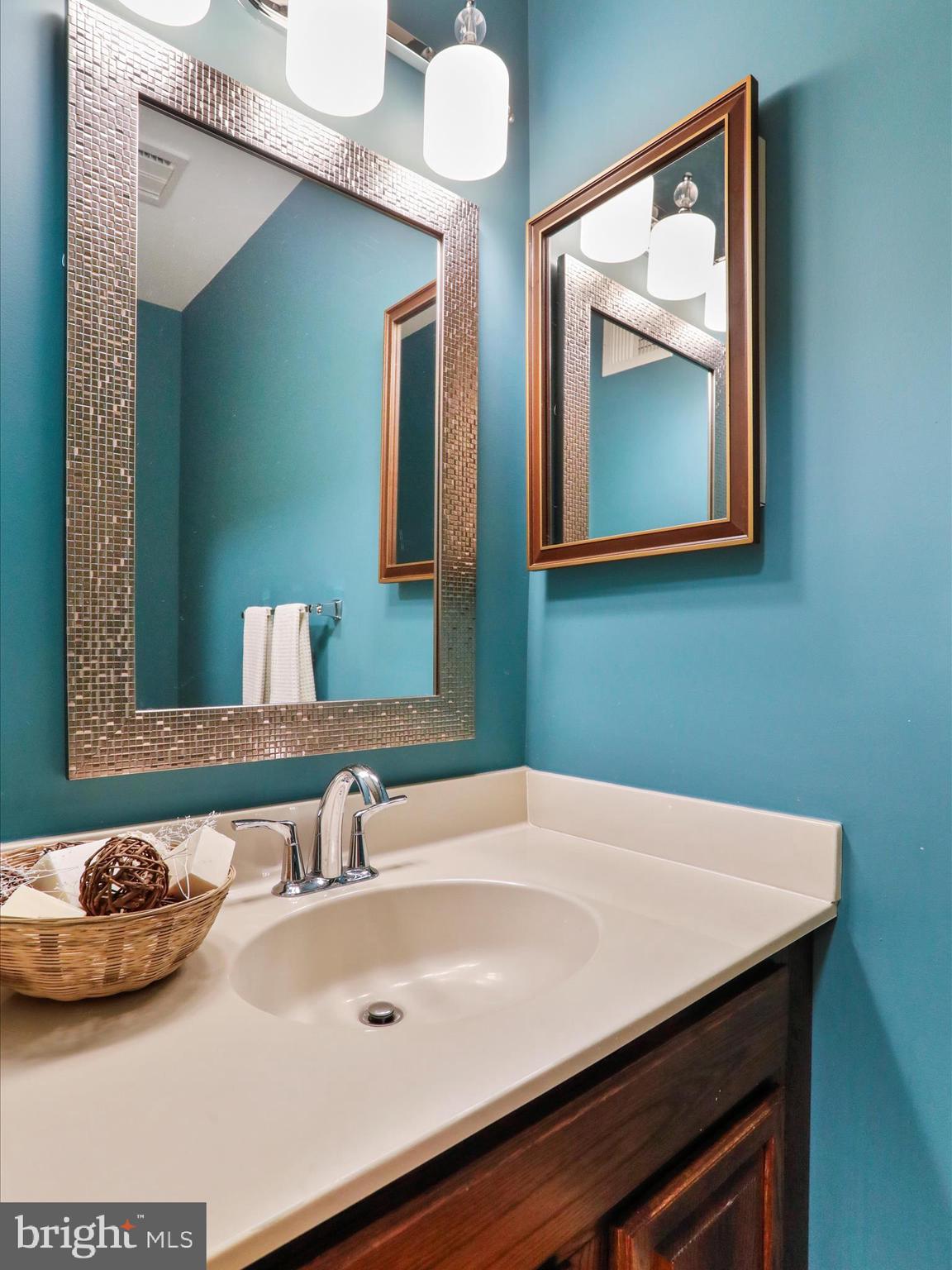 1350 Hunter Mill Road Reston, VA 20190 - Photo 32 of 75 a bathroom with a sink and a mirror