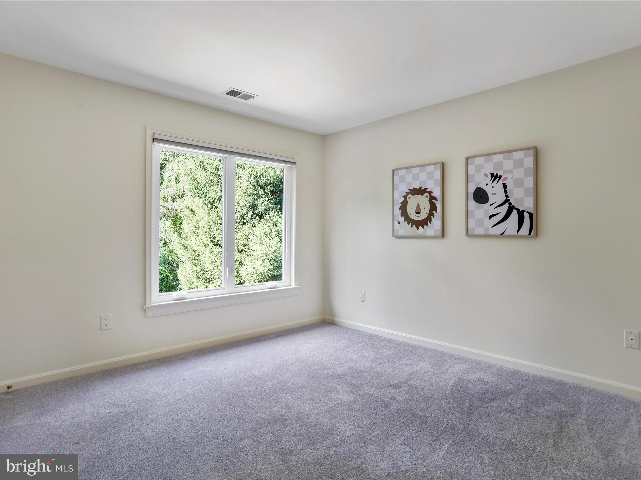 1350 Hunter Mill Road Reston, VA 20190 - Photo 41 of 75 an empty room with windows and next to a window