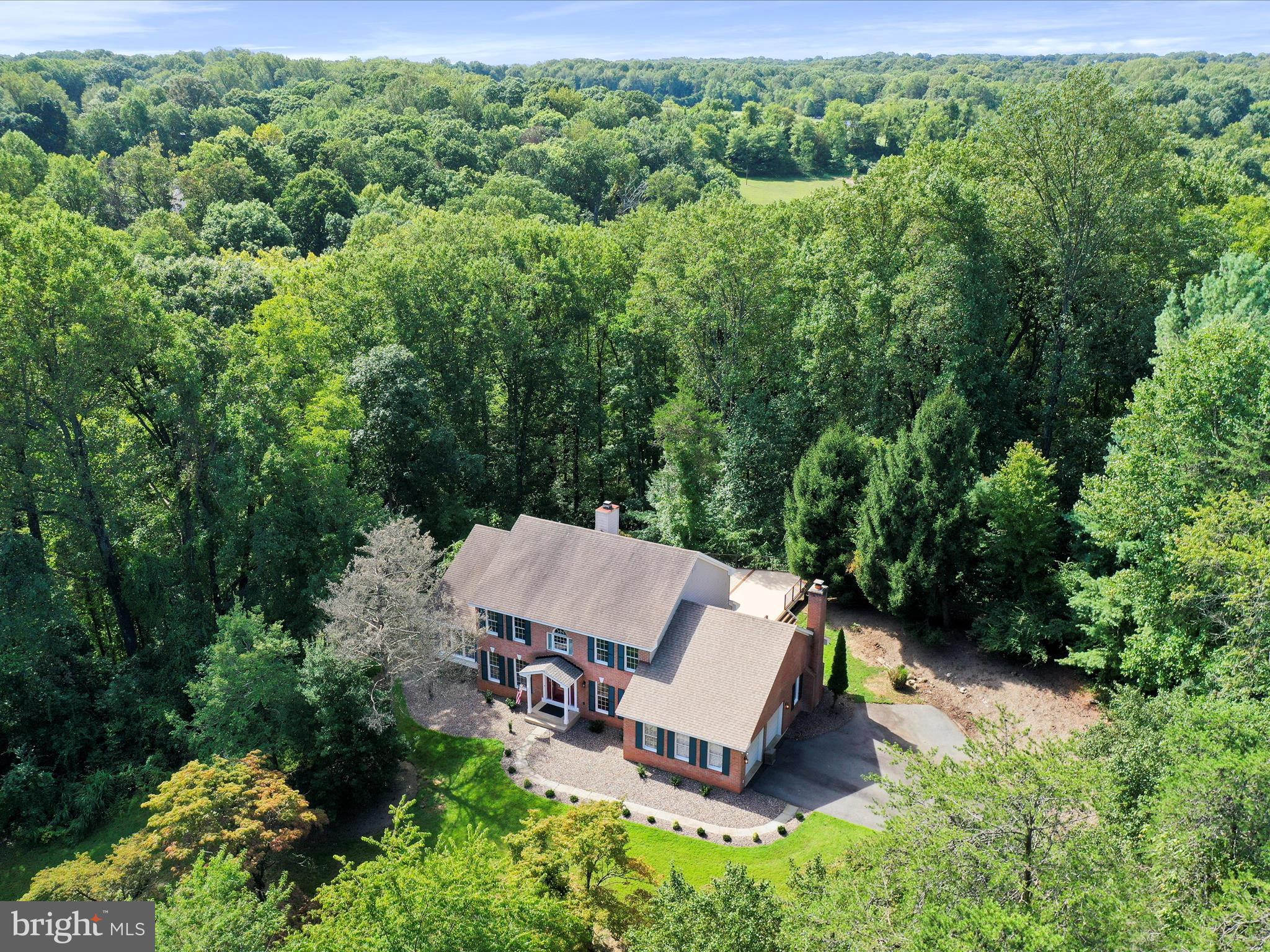1350 Hunter Mill Road Reston, VA 20190 - Photo 71 of 75 an aerial view of a house with a yard