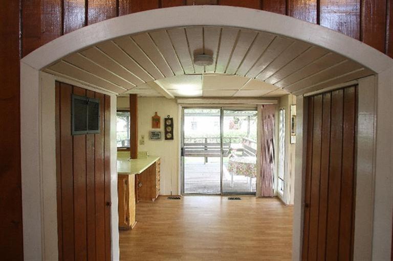 1140 Sweet Road Medford, OR 97501 - Photo 12 of 24 Archway to kitchen and dining. Slider to