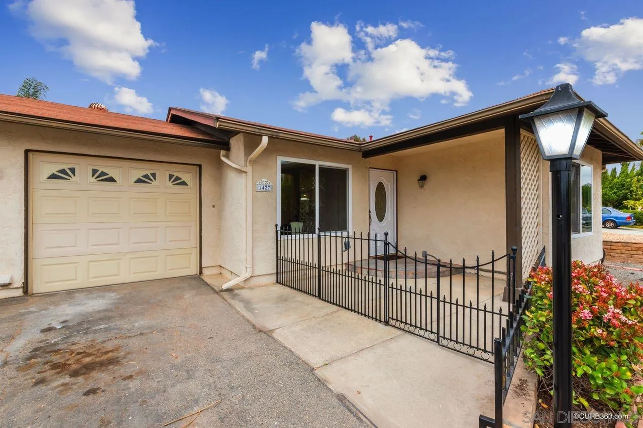 1427 Panorama Ridge Road Oceanside, CA 92056 - Photo 3 of 33 a view of a house with a garage