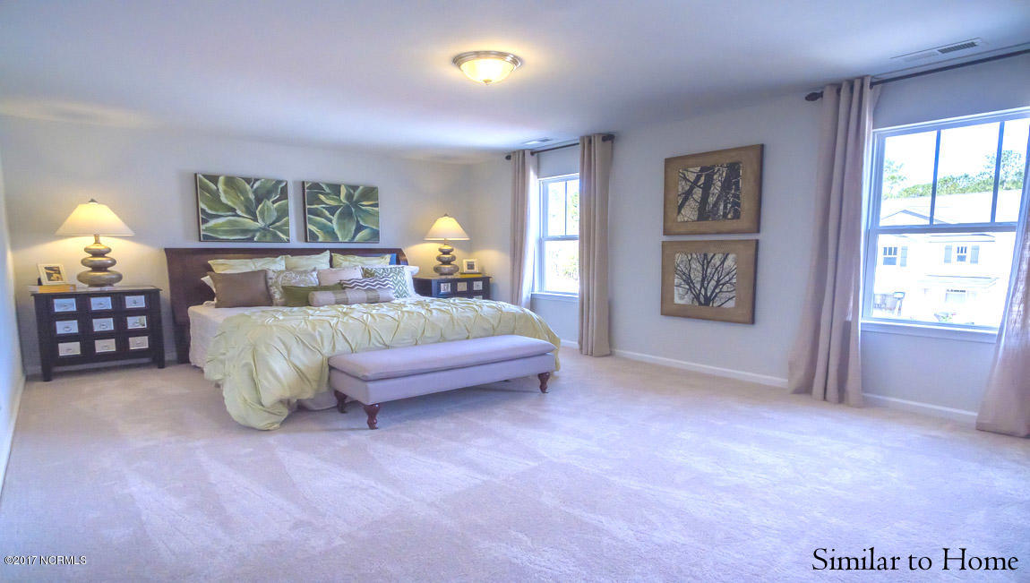 679 Morris Landing Road, Unit 147 Holly Ridge, NC 28445 - Photo 14 of 38 Master Bedroom