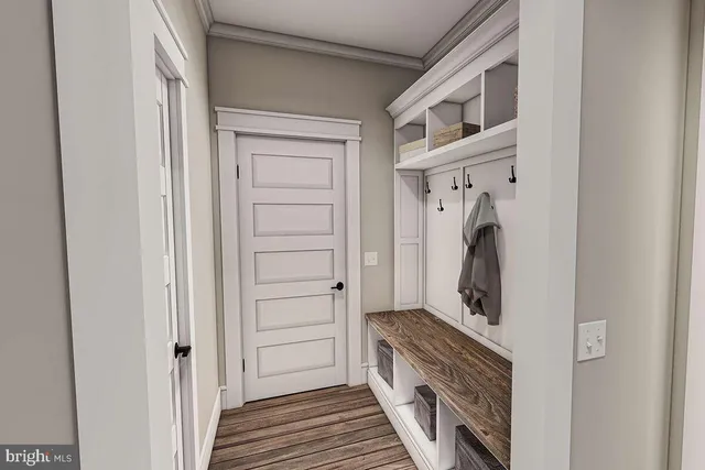 a kitchen with a refrigerator and a stove