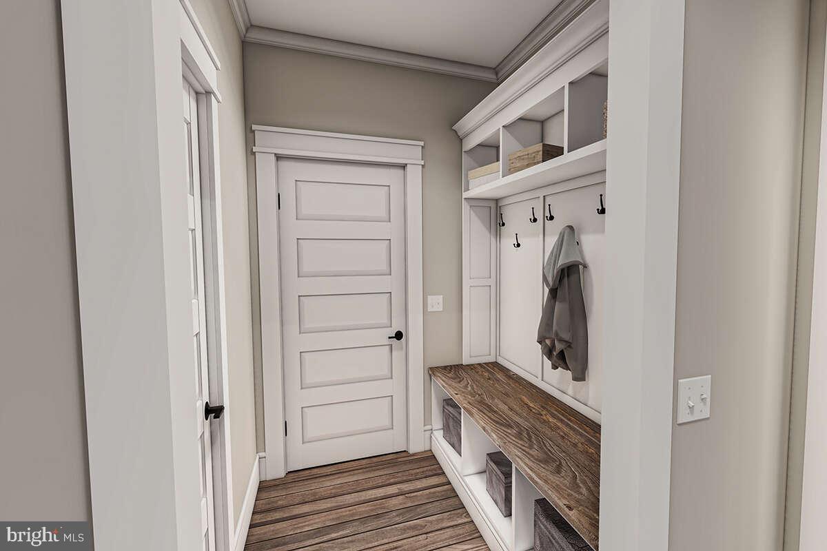 1293 Lockwood Chapel Road Hartly, DE 19953 - Photo 26 of 28 a kitchen with a refrigerator and a stove