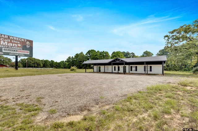 a view of porch in front of house