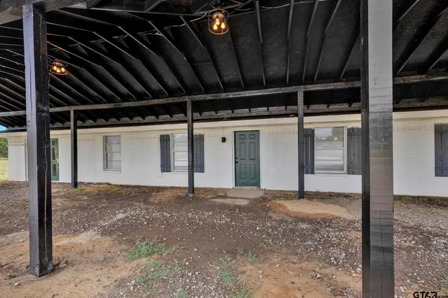 a view of hallway with closet
