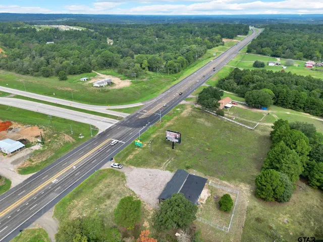 a view of a yard with front of house