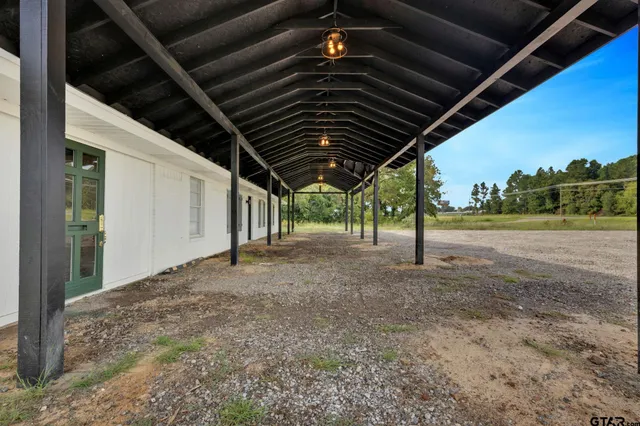 a house with trees in the background