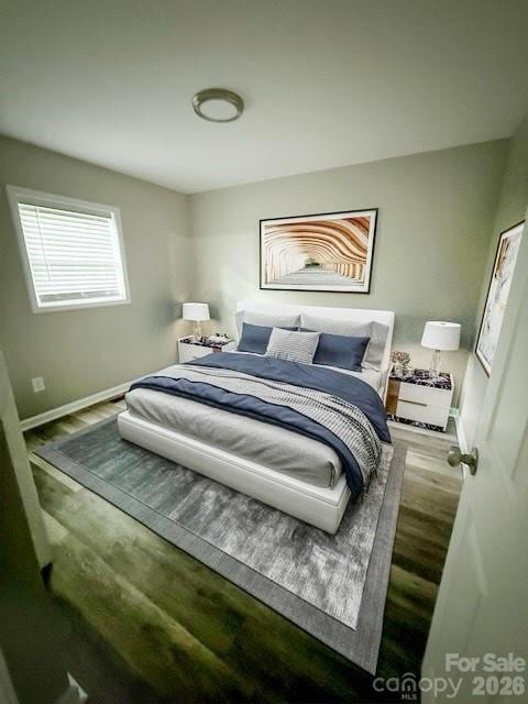 436 Clinton Avenue Lancaster, SC 29720 - Photo 5 of 11 a bedroom with bed and a window