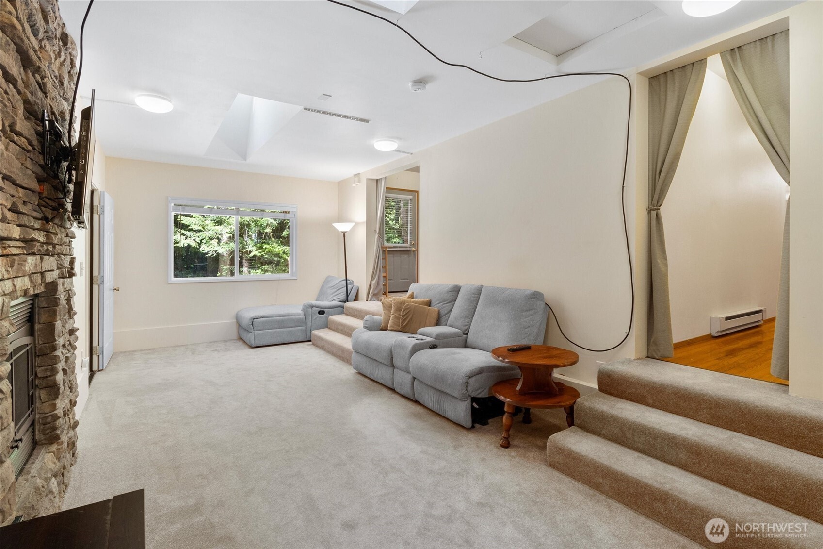 7036 Rainier Way Glacier, WA 98244 - Photo 15 of 39 a living room with furniture and a window
