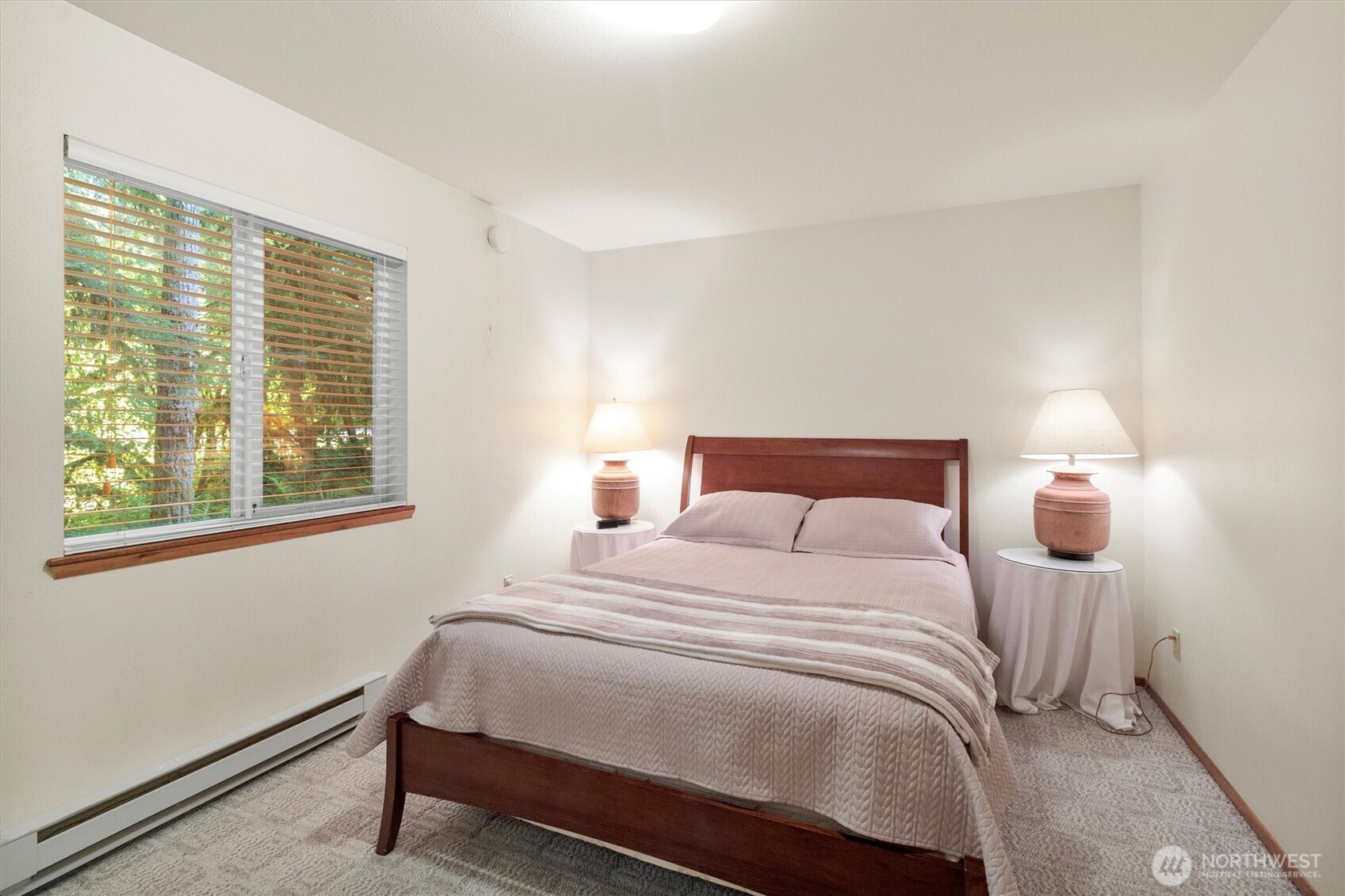 7036 Rainier Way Glacier, WA 98244 - Photo 22 of 39 a bedroom with a bed and a night stand