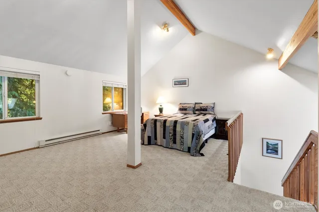 a bed room with furniture and a window