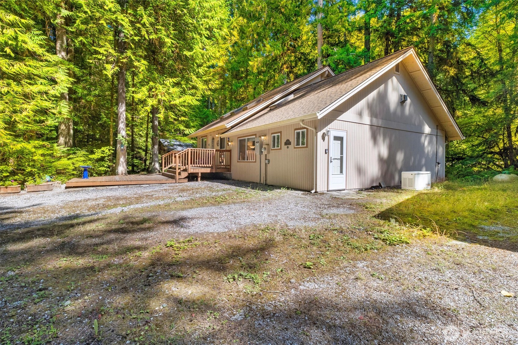 7036 Rainier Way Glacier, WA 98244 - Photo 28 of 39 a view of a house with a yard