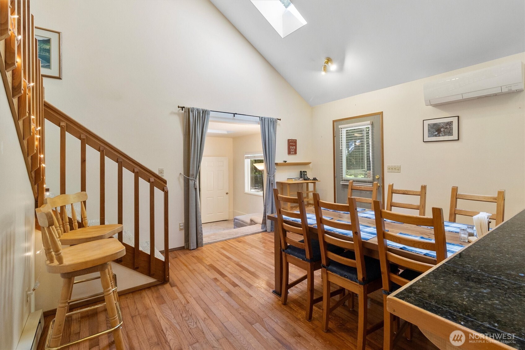 7036 Rainier Way Glacier, WA 98244 - Photo 8 of 39 a view of a dining room with furniture and wooden floor