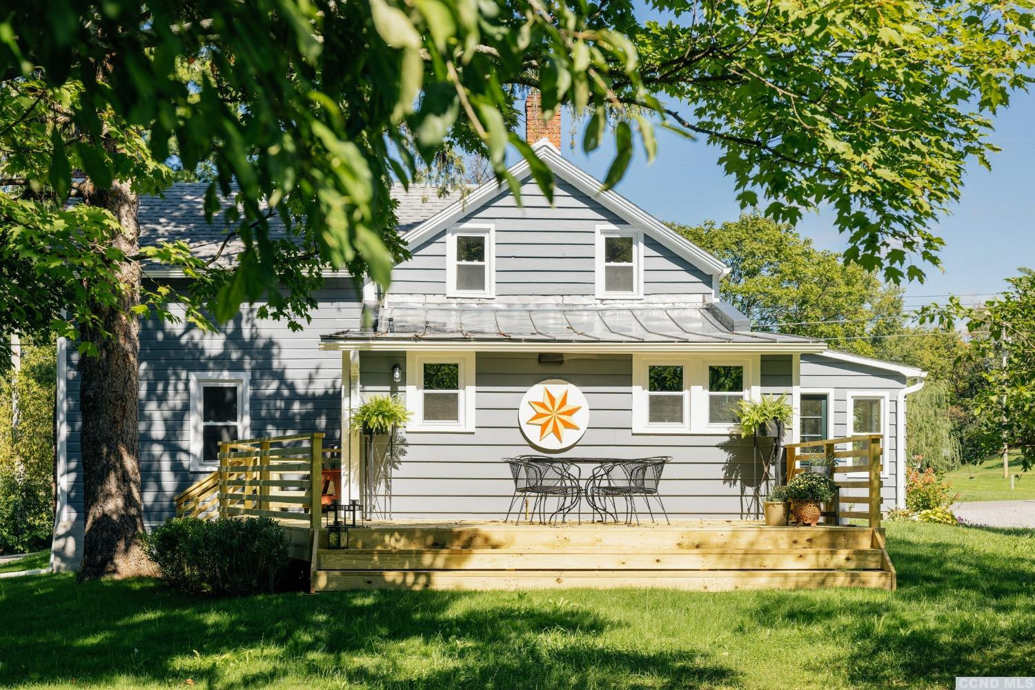 85 Roundtop Road Germantown, NY 12526 - Photo 1 of 31 a front view of a house with a yard