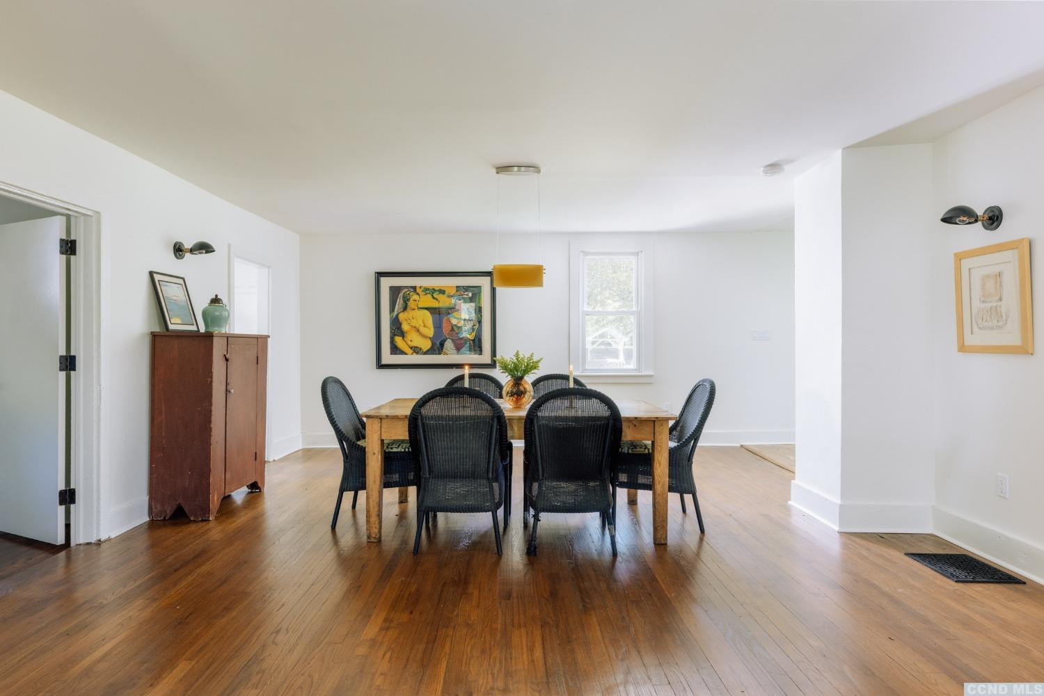 85 Roundtop Road Germantown, NY 12526 - Photo 11 of 31 a view of a dining room with furniture and wooden floor