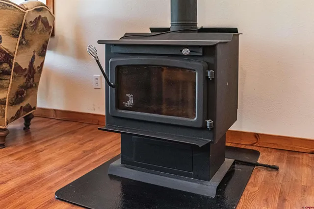 a stove top oven sitting inside of a kitchen