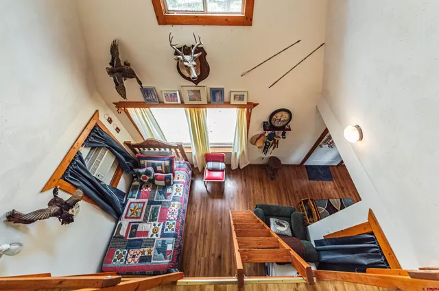 an aerial view of a highlighted house