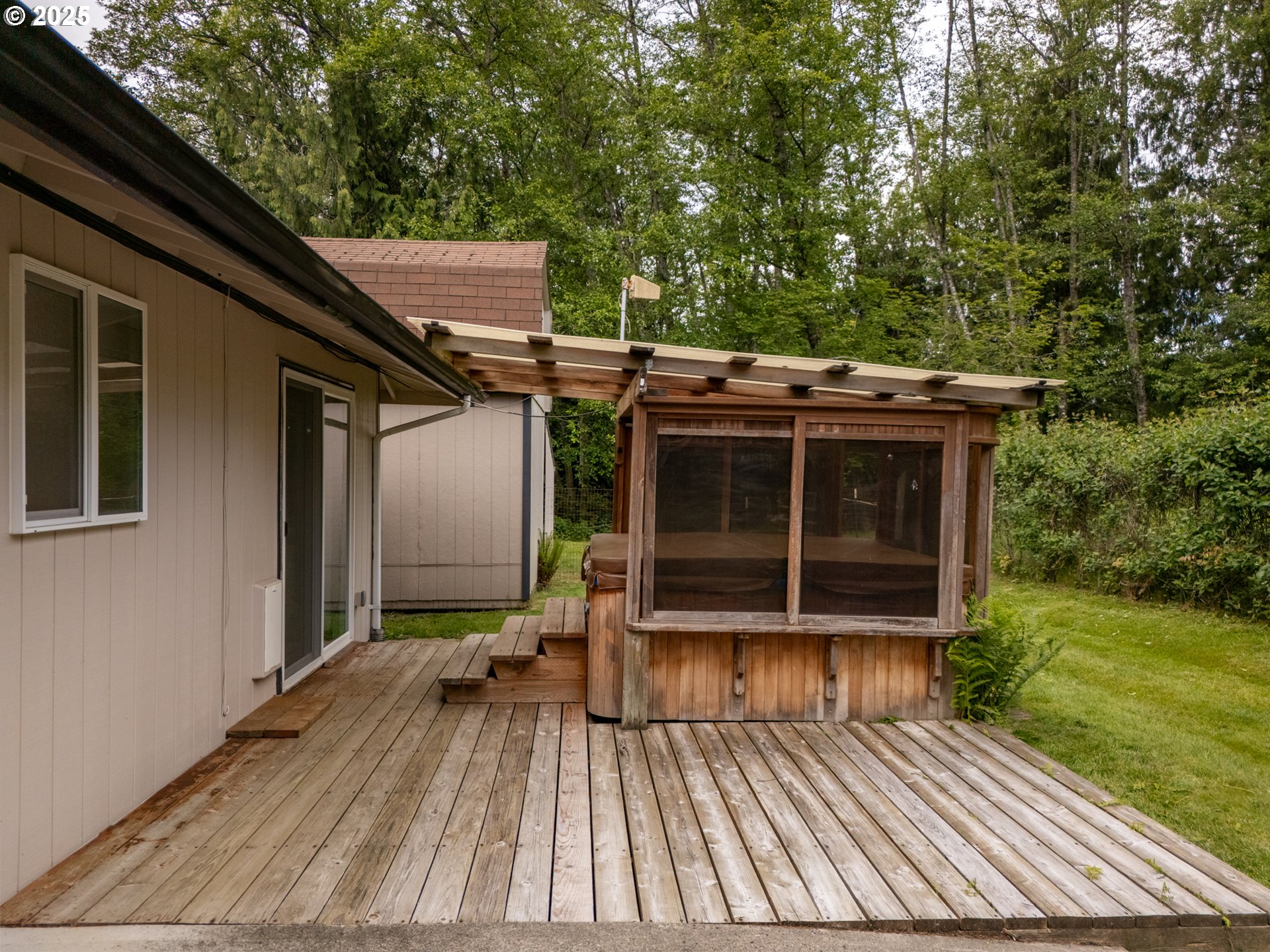 31052 Brownlee Road Rainier, OR 97048 - Photo 11 of 47 a view of outdoor space with deck and yard
