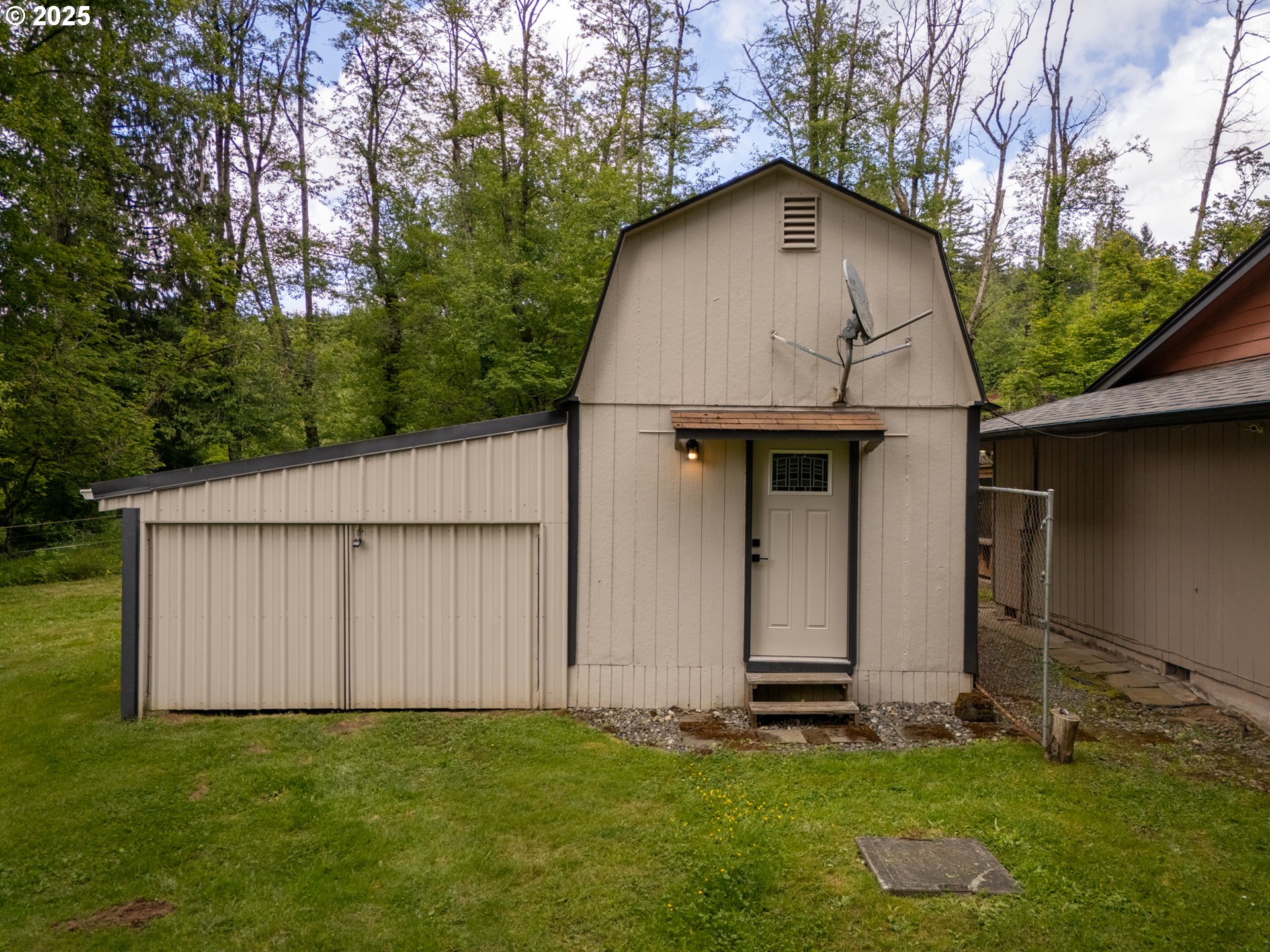 31052 Brownlee Road Rainier, OR 97048 - Photo 14 of 47 a view of a backyard with a small cabin