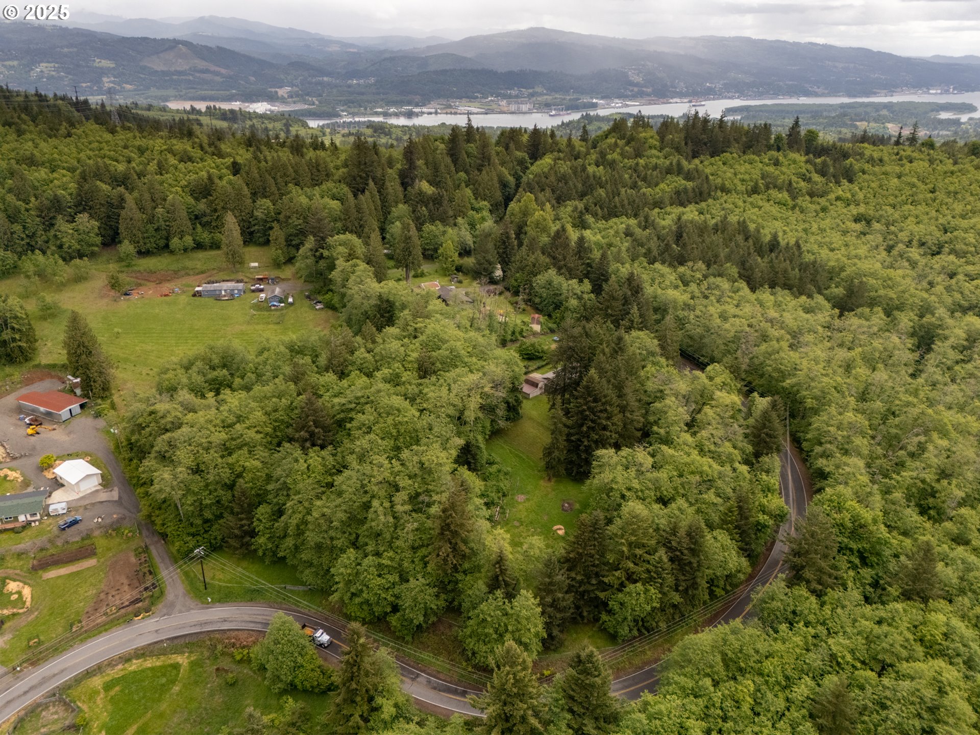 31052 Brownlee Road Rainier, OR 97048 - Photo 26 of 47 an aerial view of a houses with a yard