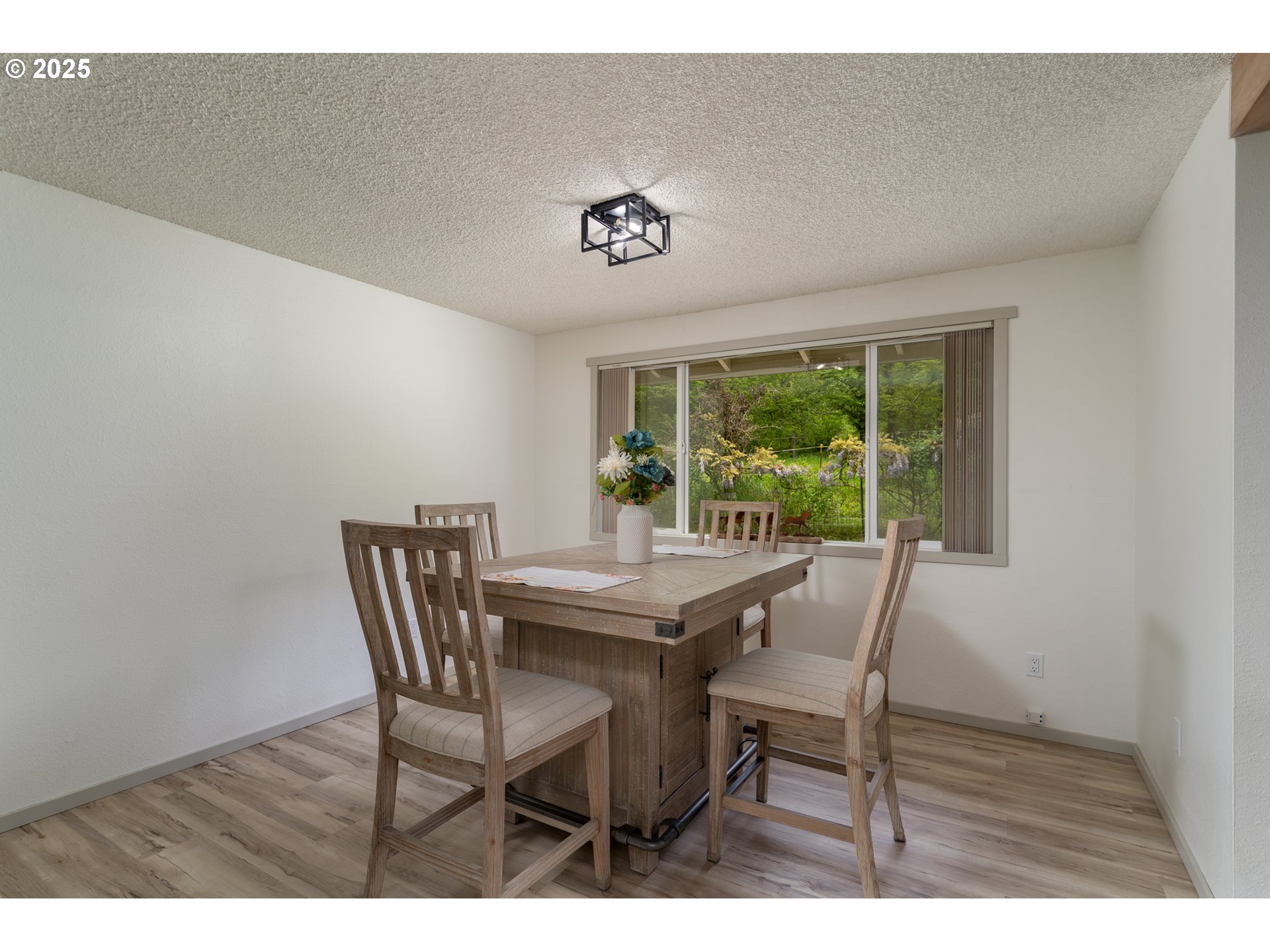31052 Brownlee Road Rainier, OR 97048 - Photo 33 of 47 a view of a dining room with furniture and a window