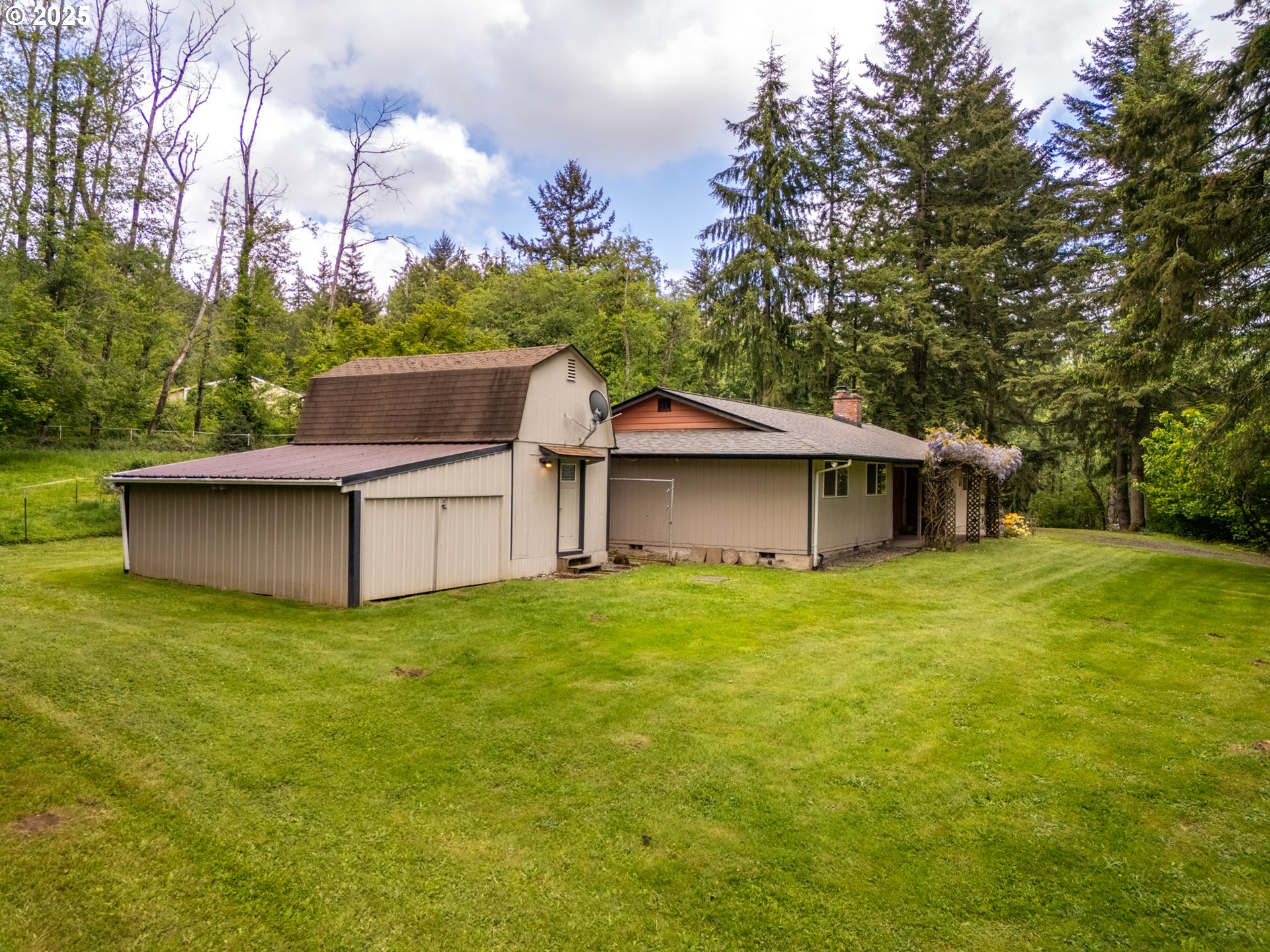31052 Brownlee Road Rainier, OR 97048 - Photo 4 of 47 a view of a house with yard and a tree