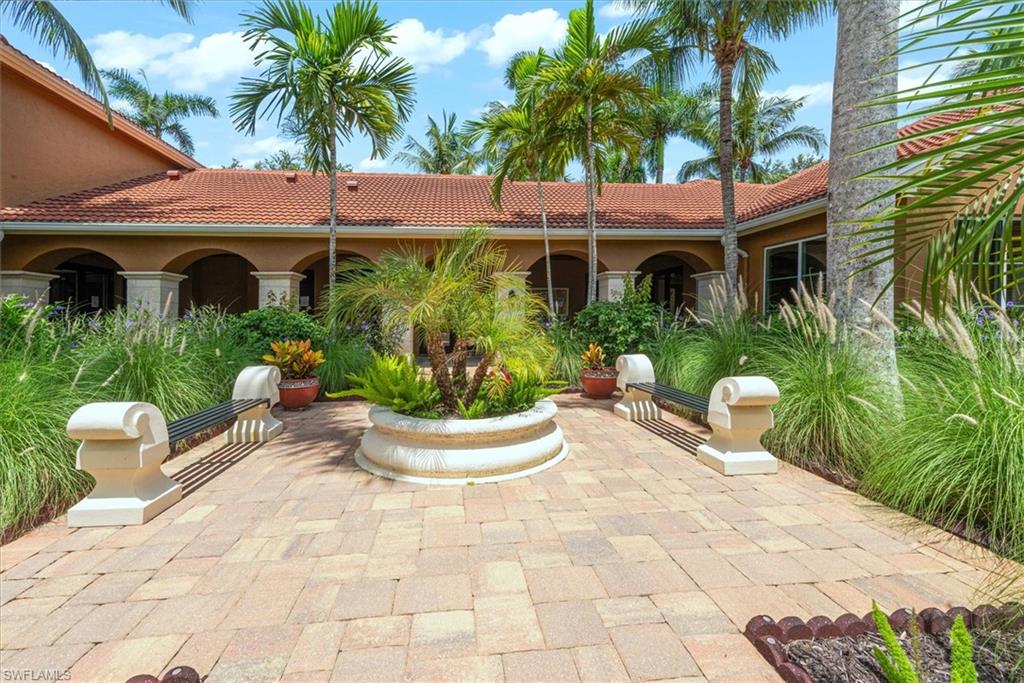 1170 Reserve Way, Unit 107 Naples, FL 34105 - Photo 34 of 47 View of patio