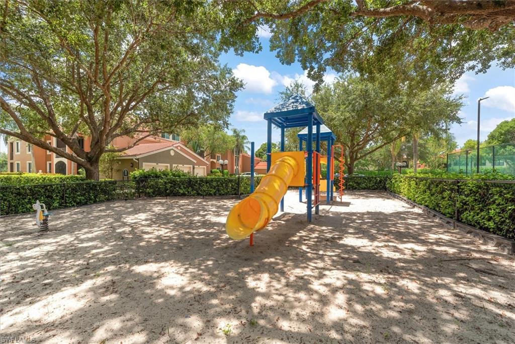 1170 Reserve Way, Unit 107 Naples, FL 34105 - Photo 38 of 47 View of communal playground