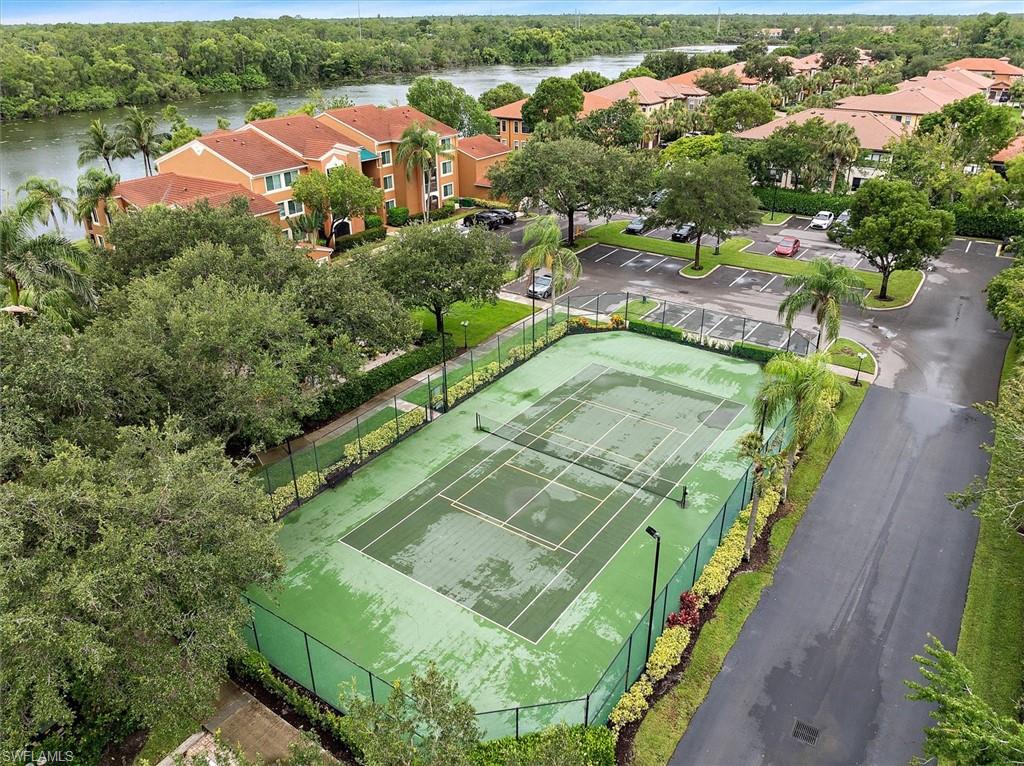 1170 Reserve Way, Unit 107 Naples, FL 34105 - Photo 40 of 47 Aerial view of a large body of water