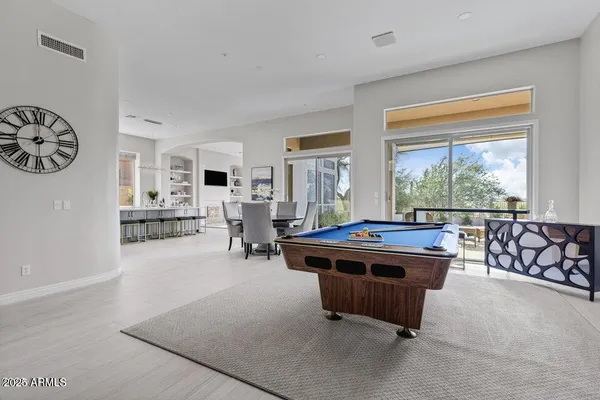 a living room with a couch and a table
