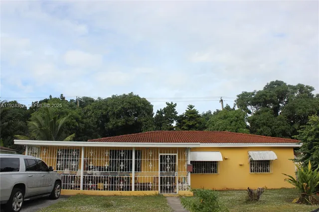 a view of a backyard with a garden