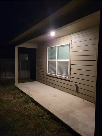 a view of swimming pool from a balcony