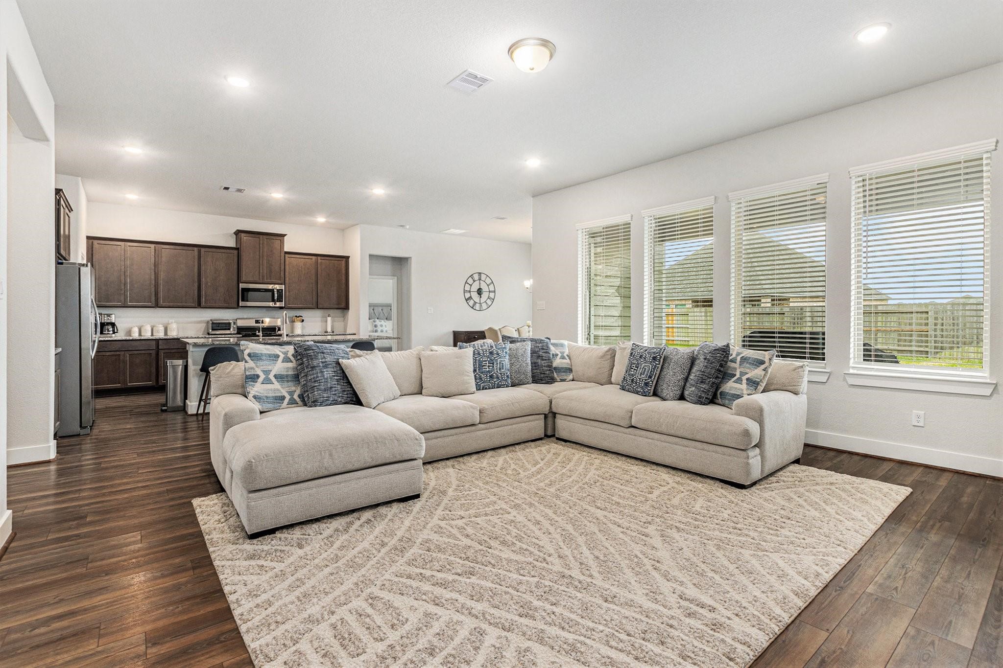 1818 Homewood Point Lane Rosharon, TX 77583 - Photo 17 of 41 a living room with furniture and a large window