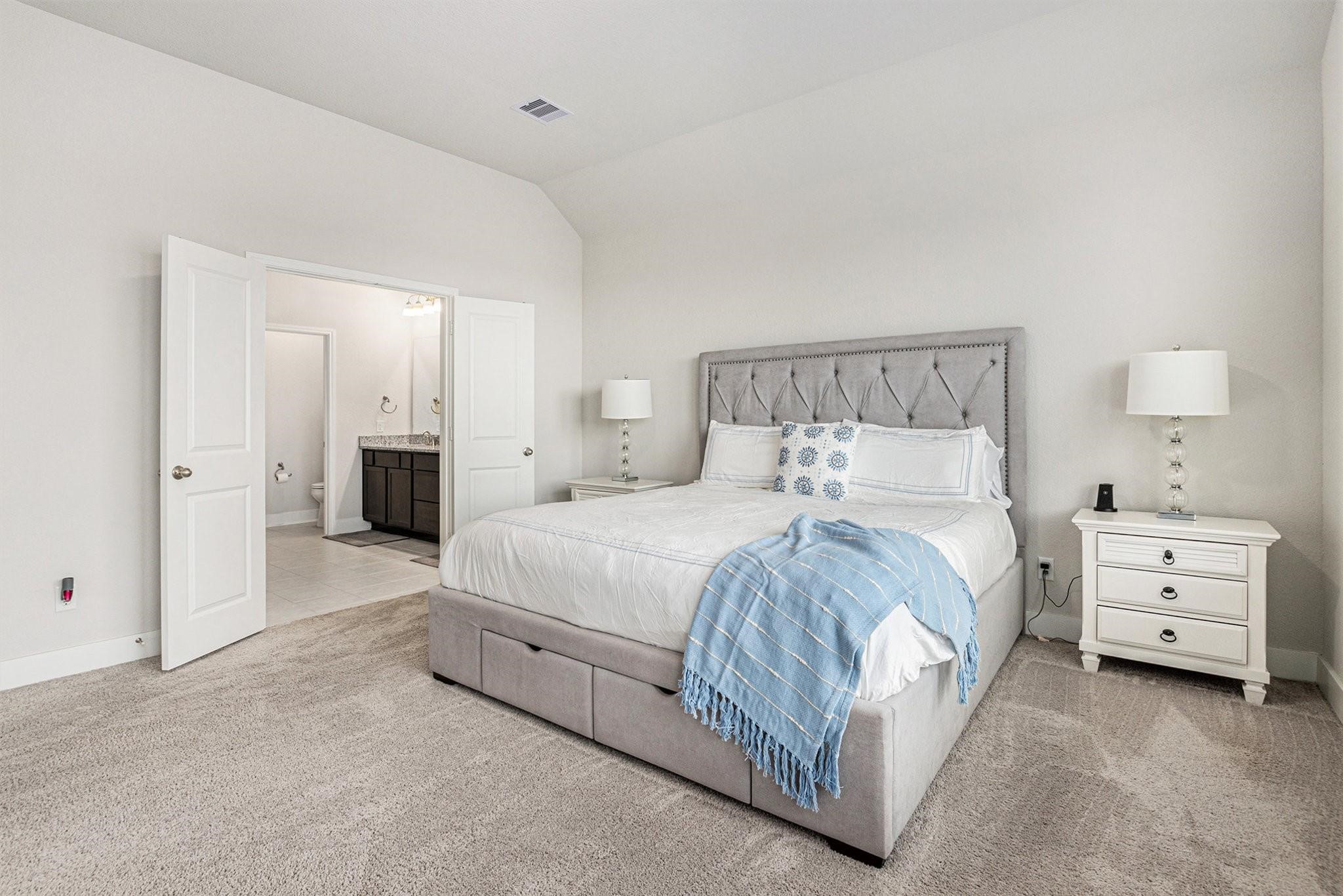 1818 Homewood Point Lane Rosharon, TX 77583 - Photo 19 of 41 a bed room with a bed and a night stand