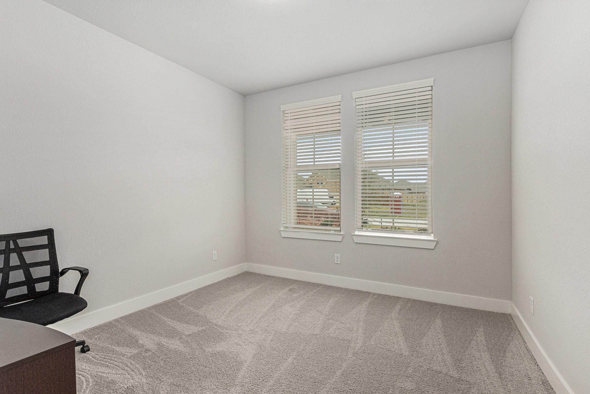 1818 Homewood Point Lane Rosharon, TX 77583 - Photo 27 of 41 a view of an empty room with a window
