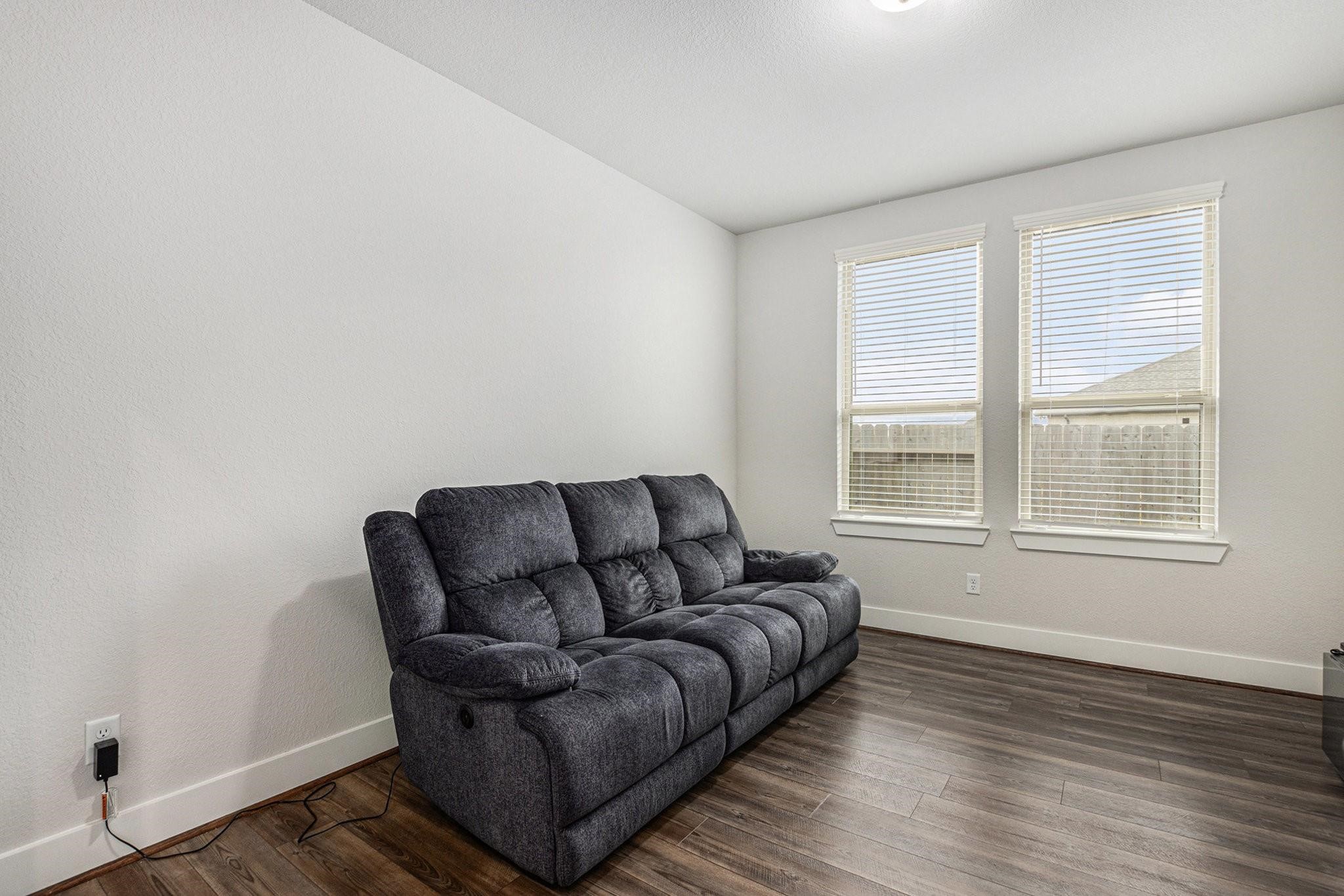 1818 Homewood Point Lane Rosharon, TX 77583 - Photo 29 of 41 a living room with furniture and a window