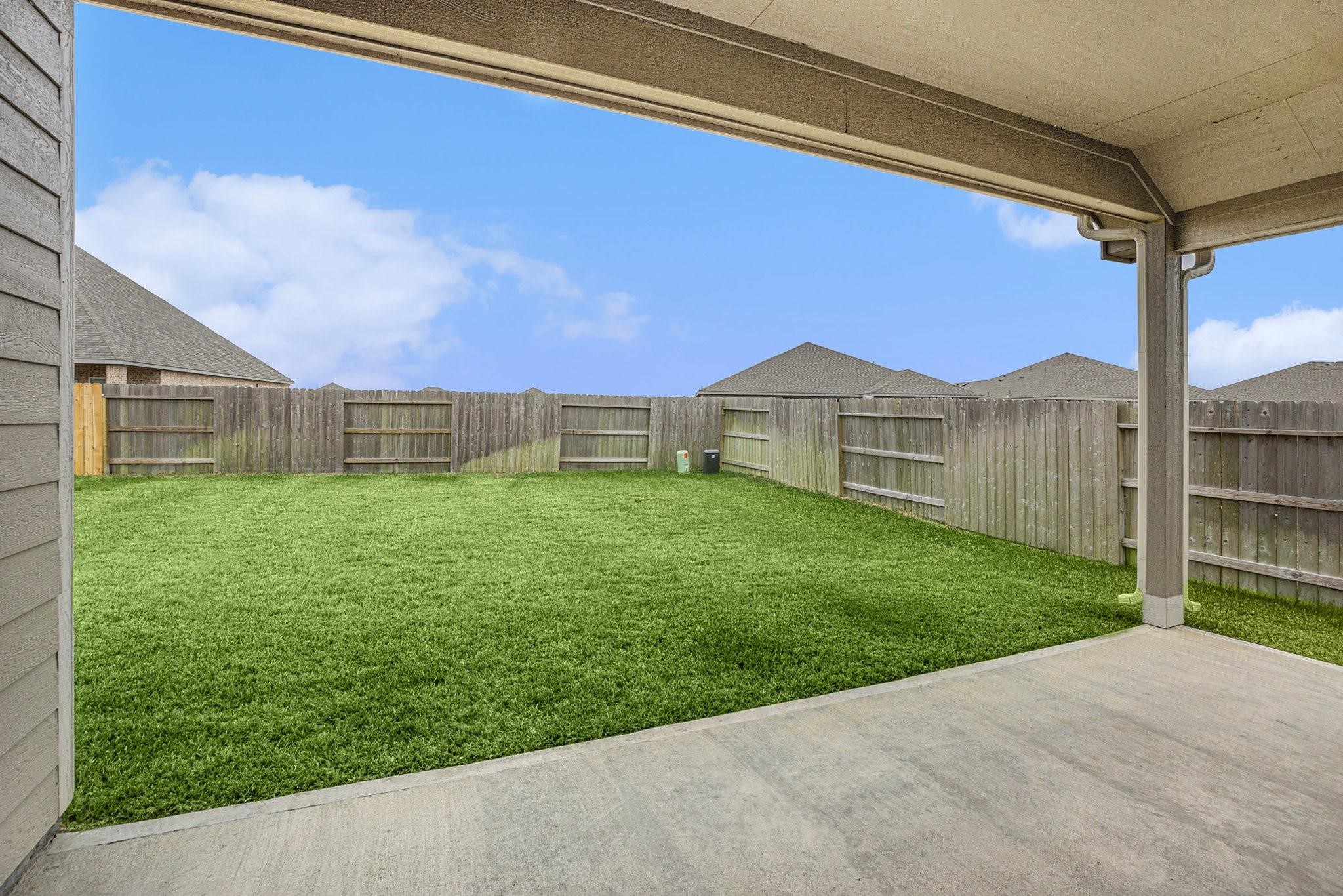 1818 Homewood Point Lane Rosharon, TX 77583 - Photo 33 of 41 a view of a house with a yard