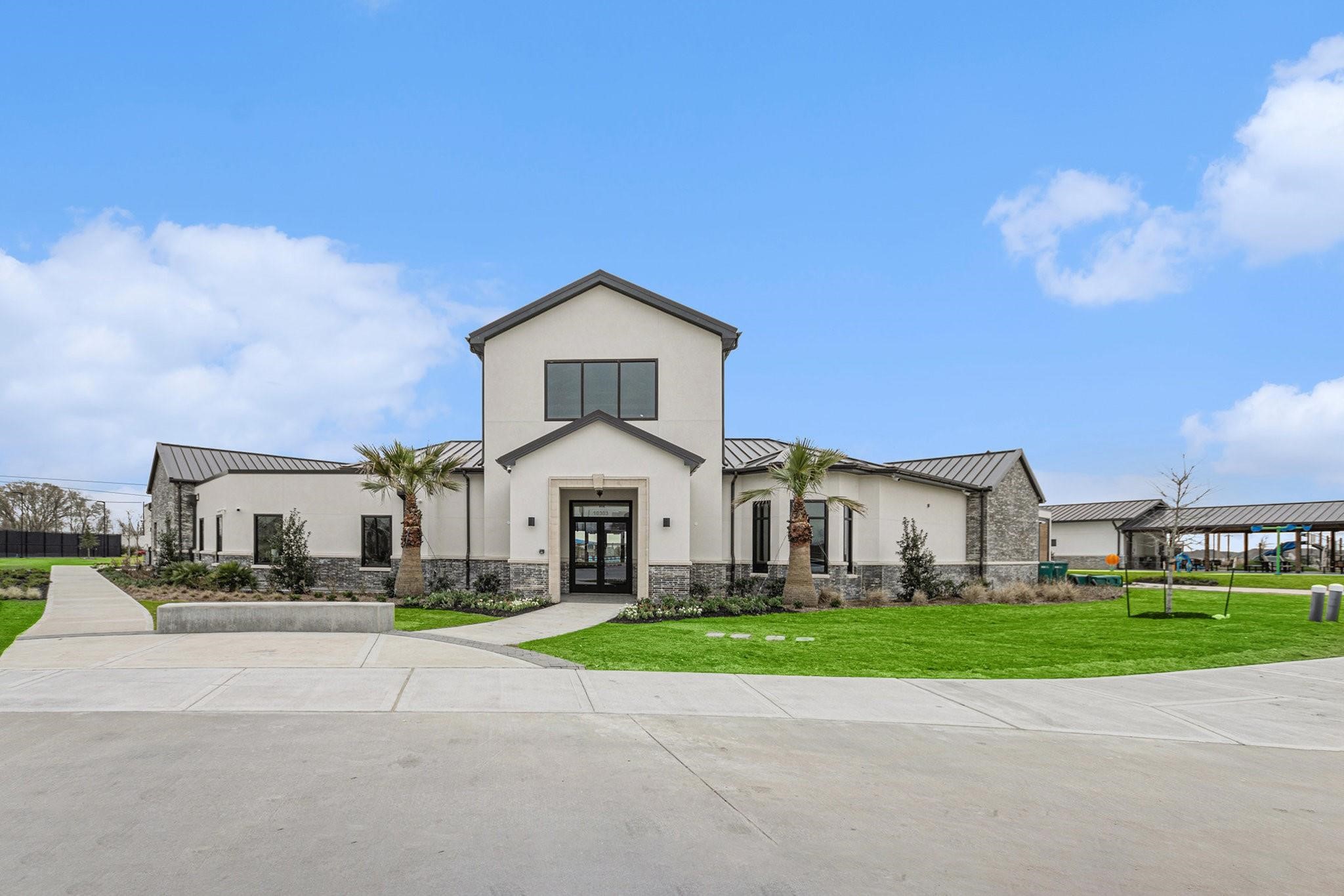1818 Homewood Point Lane Rosharon, TX 77583 - Photo 34 of 41 a front view of a house with a yard and trees