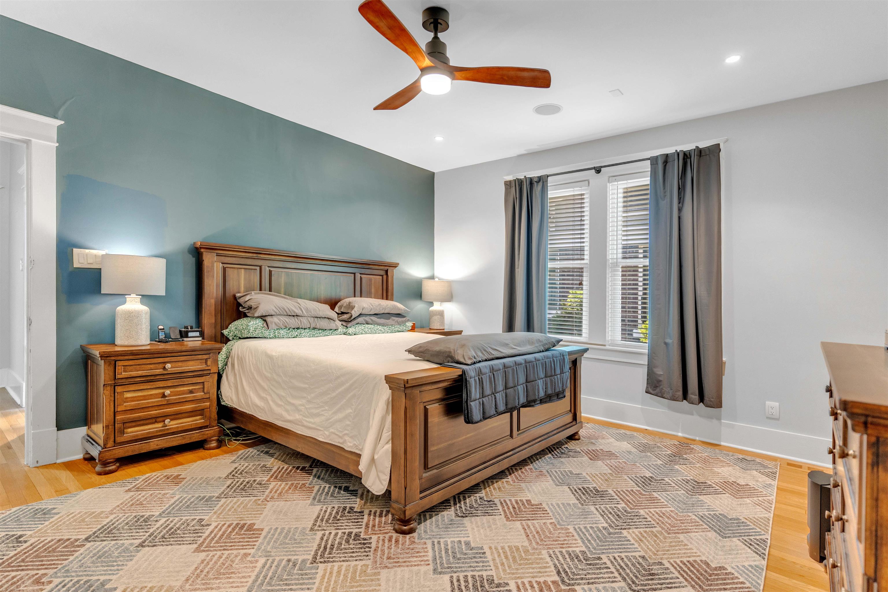 1757 Carruthers Place Memphis, TN 38112 - Photo 19 of 40 a bedroom with a bed and a chandelier