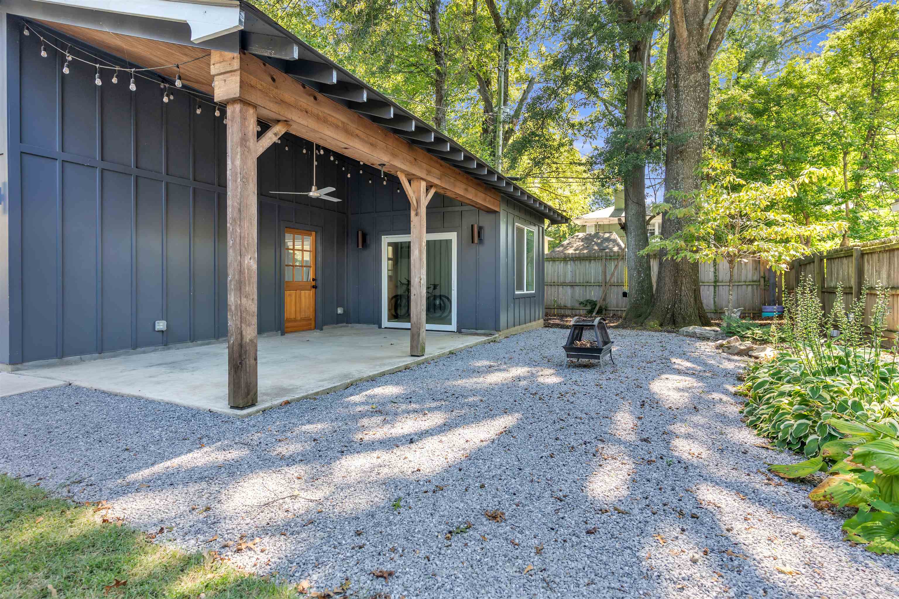 1757 Carruthers Place Memphis, TN 38112 - Photo 28 of 40 a view of a house with backyard and trees