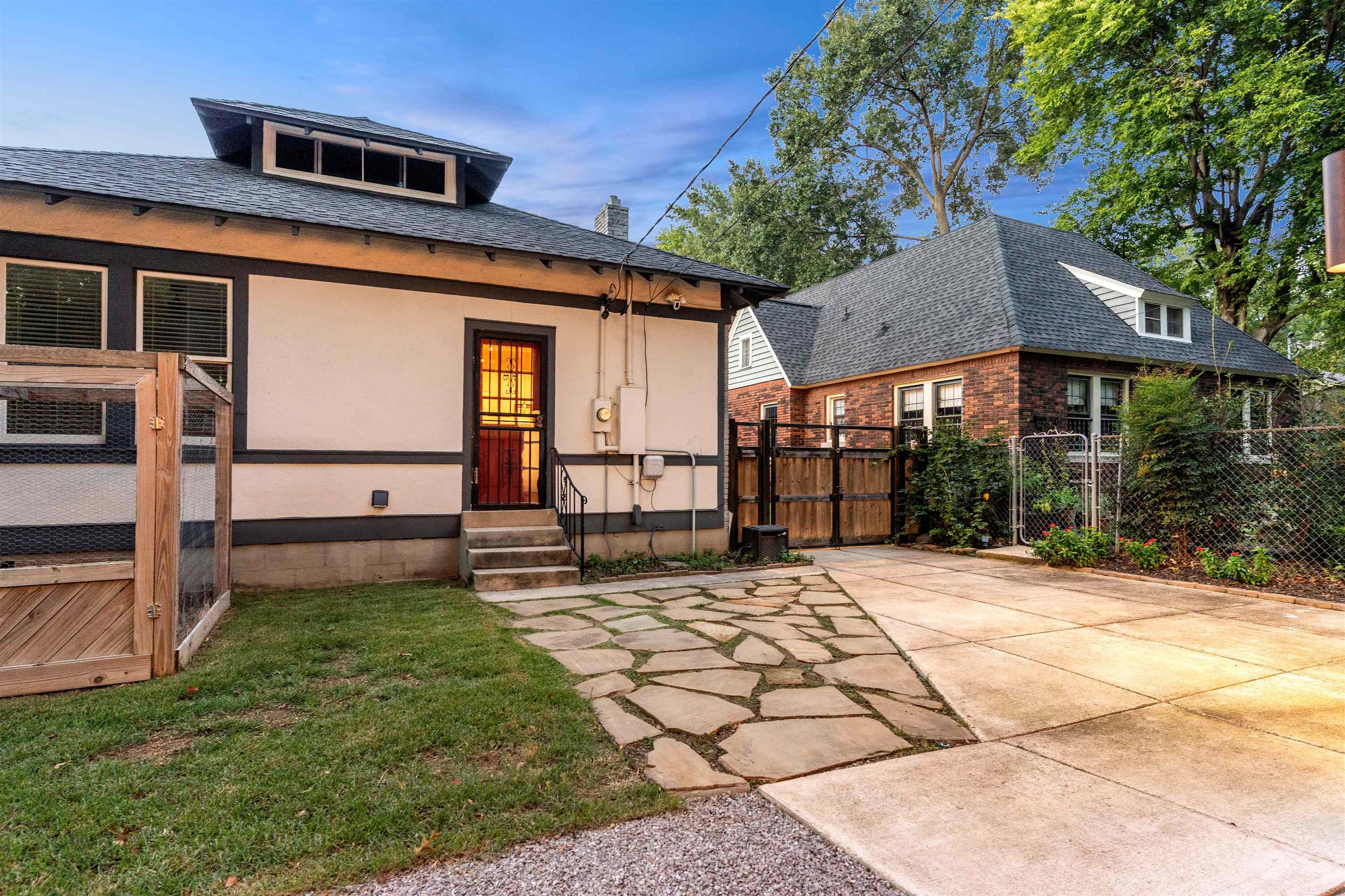 1757 Carruthers Place Memphis, TN 38112 - Photo 33 of 40 a backyard of a house with garden and outdoor seating