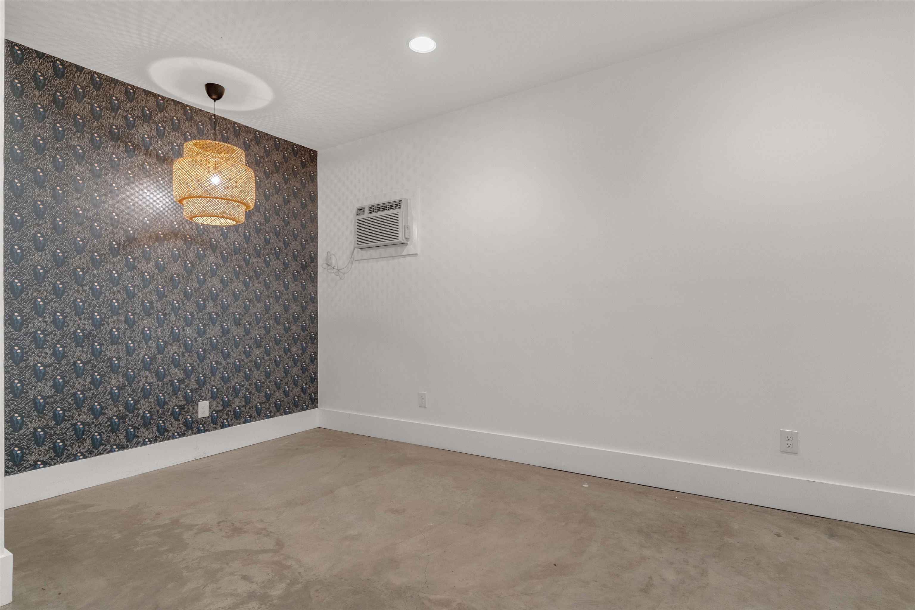 1757 Carruthers Place Memphis, TN 38112 - Photo 36 of 40 a view of an empty room with window and wooden floor
